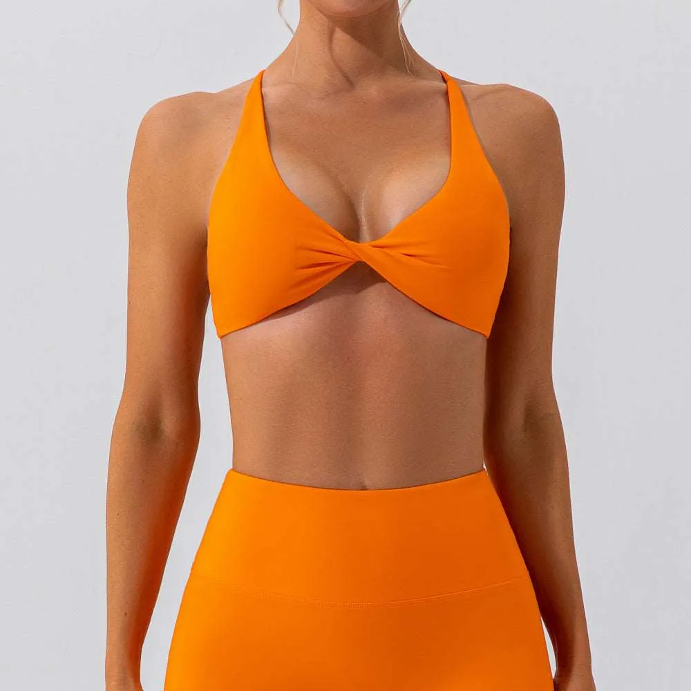 Cross back twisted front sports bra